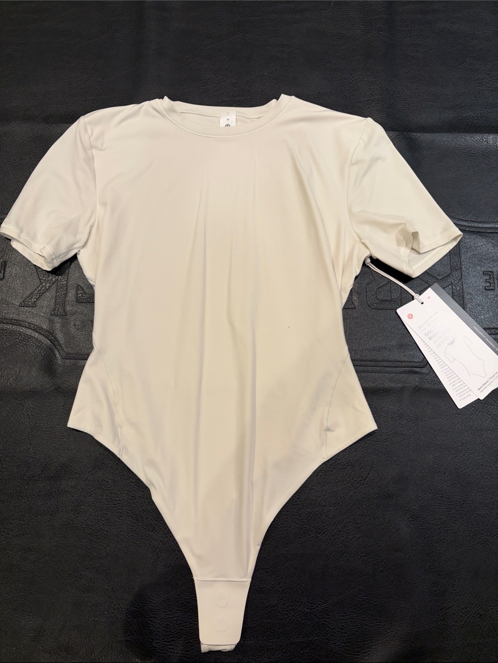 lululemon athletica Women's Nulu Short Sleeve Crew Bodysuit in Bone NWT Medium